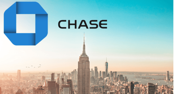 Chase logo above a skyline view of New York City with the Empire State Building in the center under a blue sky.