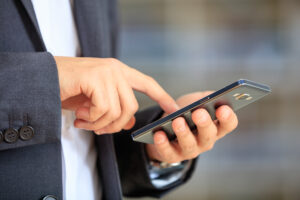 Businessman holding a mobile phone