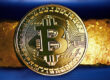 Bitcoin and gold bar