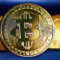Bitcoin and gold bar