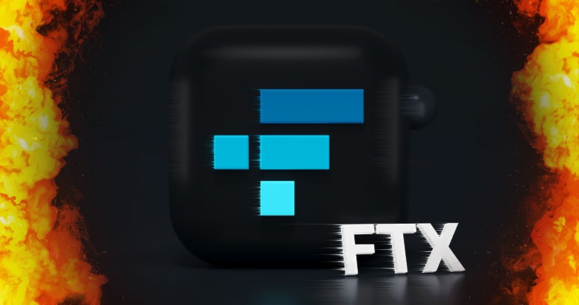 FTX logo in blue on a black background with flames on the sides and the text "FTX" in bold white letters at the bottom right.
