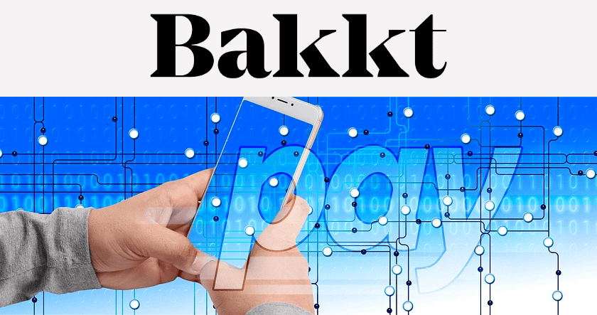 Hands holding a smartphone with a digital background and the word "Bakkt" at the top, symbolizing digital payments or cryptocurrency transactions.