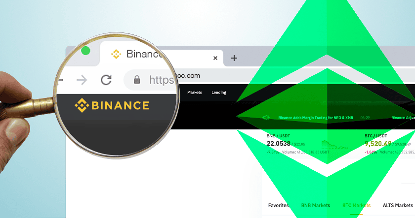 A magnifying glass focuses on the Binance logo in a web browser, with green digital graphics overlaying part of the image.