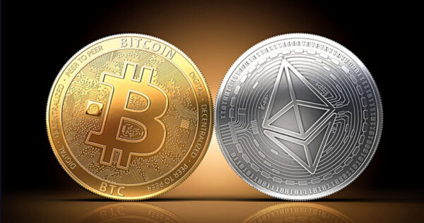 Two large coins displayed side by side: a gold Bitcoin on the left and a silver Ethereum coin on the right, both glowing against a dark background.