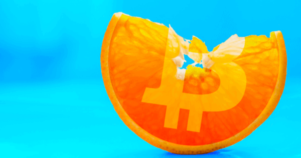 A slice of orange with a visible Bitcoin logo overlay, set against a bright blue background.