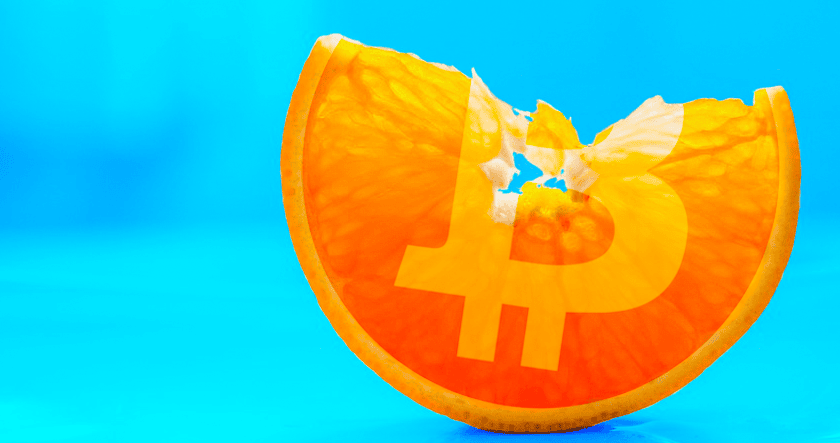 A slice of orange with a visible Bitcoin logo overlay, set against a bright blue background.