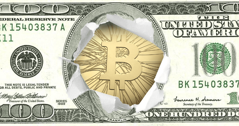 A gold Bitcoin symbol appears through a torn hole in the center of a US one hundred dollar bill.