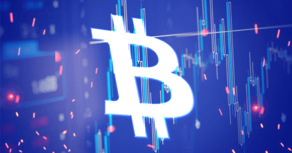 Large Bitcoin symbol overlaid on a digital financial chart with fluctuating blue and red candlestick patterns and data graphs in the background.