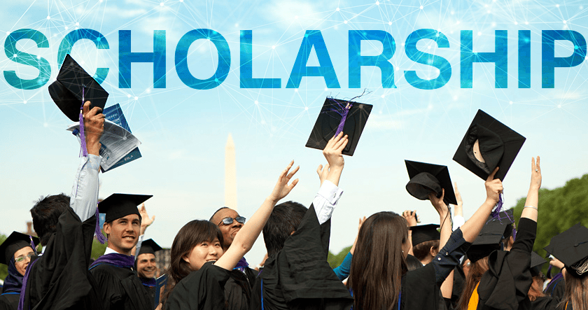 A group of graduates in caps and gowns celebrate by raising their caps, with the word "SCHOLARSHIP" displayed in large letters above them.