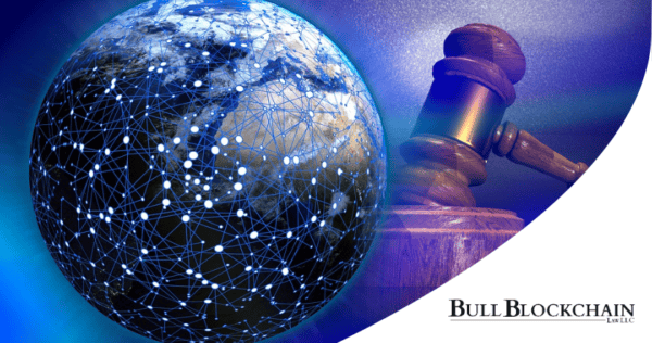 A digital globe with network connections beside a judge's gavel, representing blockchain technology and legal regulation. 