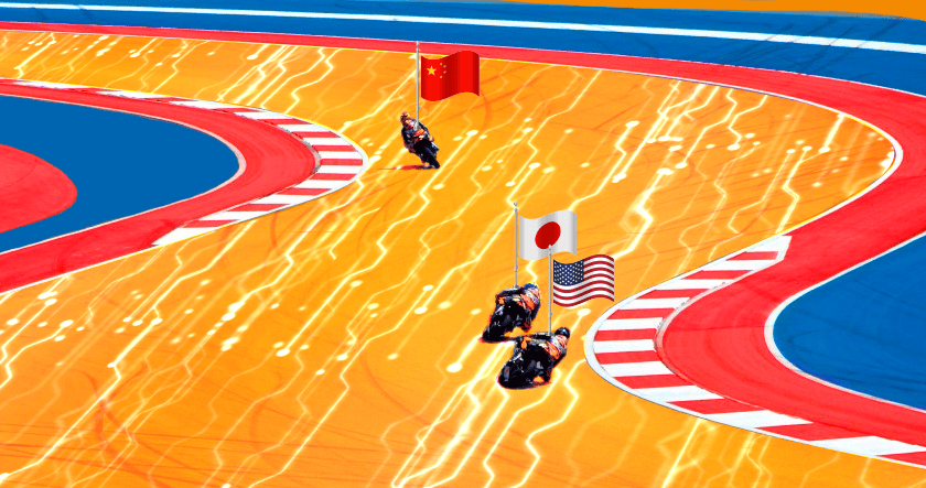 Three motorcyclists race on a brightly colored track, each carrying a national flag: China, Japan, and the United States.