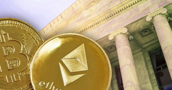 Gold-colored Bitcoin and Ethereum coins are shown in front of a classical government building with large columns.