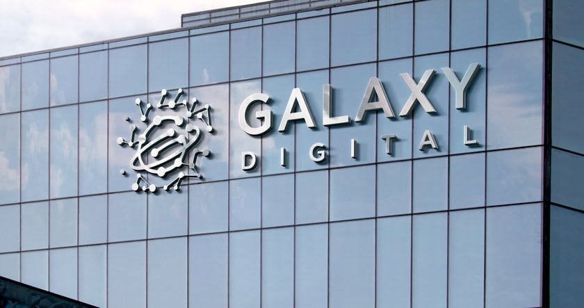 The glass facade of a building displays the "Galaxy Digital" logo with stylized graphics and the company name in large letters.