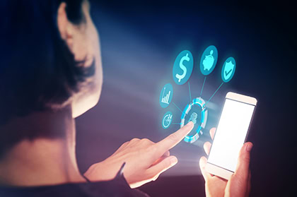 A person uses a smartphone with a holographic fingerprint scanner and digital finance icons, suggesting secure mobile banking or payment authentication.