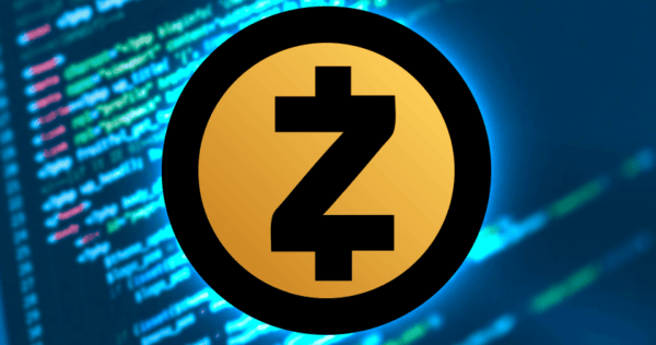 A large Zcash cryptocurrency logo is centered over a blurred background of computer code on a screen.