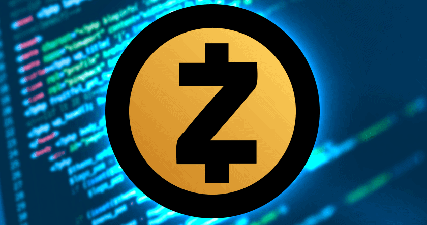 A large Zcash cryptocurrency logo is centered over a blurred background of computer code on a screen.